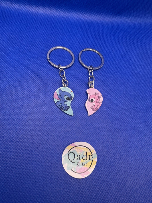 💙💗 Duo de porte-clés “Stitch & Angel” – Édition Cœurs Brisés